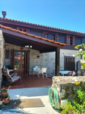 CASA DE MADEIRA E PEDRA